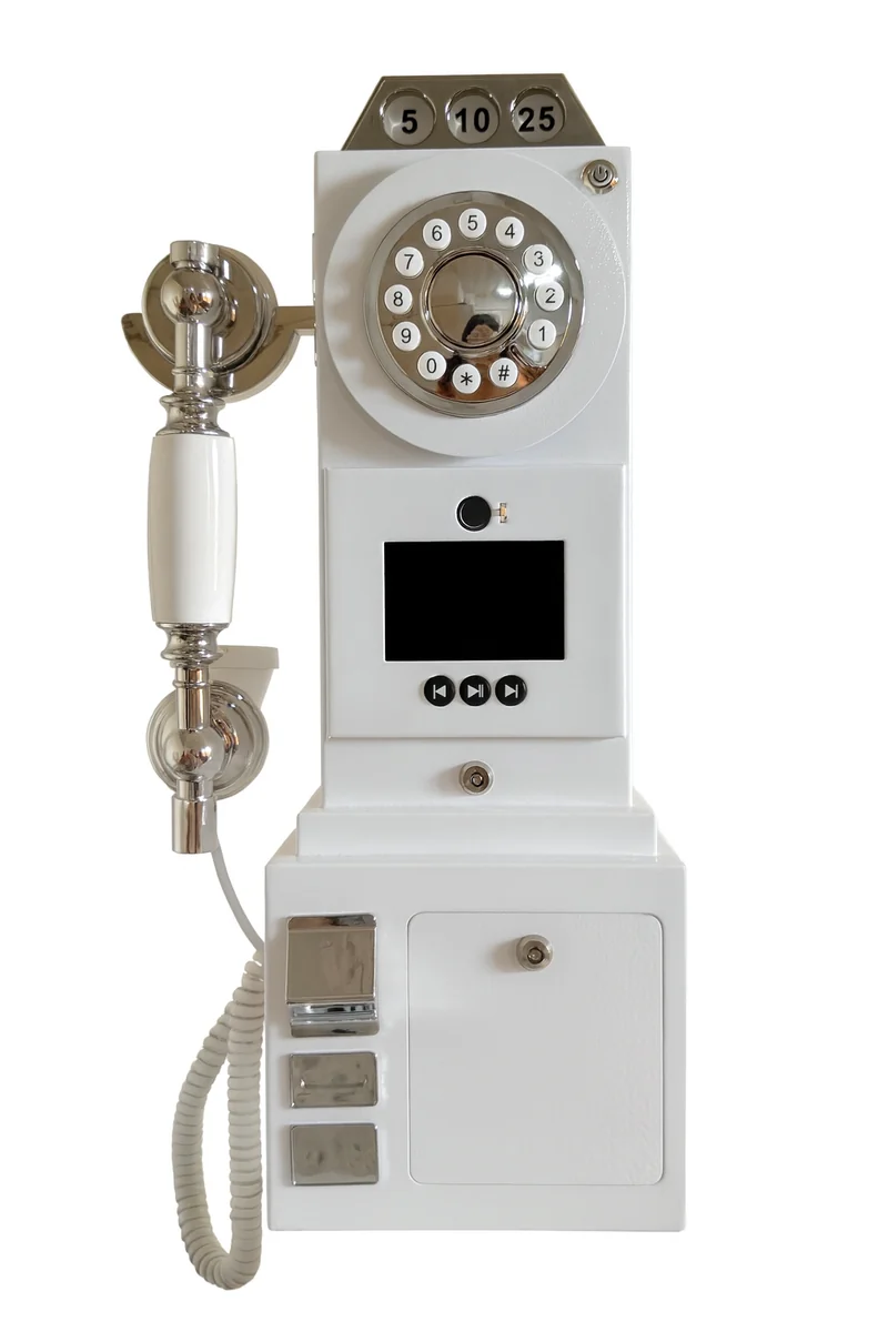 The Memorings white video guestbook device with telephone handset, camera, screen, and rotary-style dial